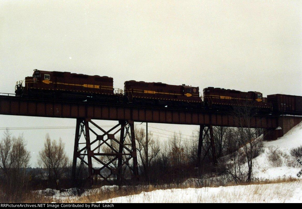 Local rolls west off the Oliver Bridge